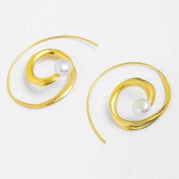 Gold spiral earrings with pearls on a white background