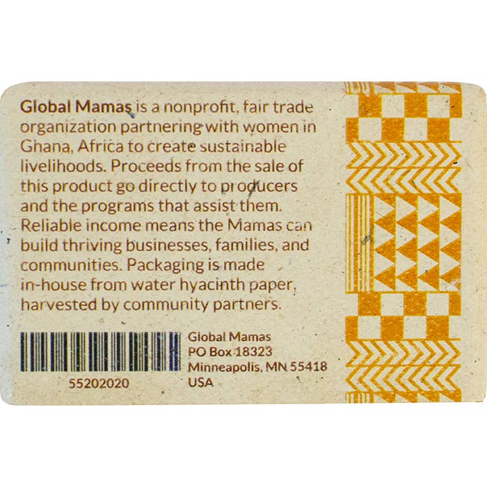 Back of a product label with text about Global Mamas and their fair trade practices.