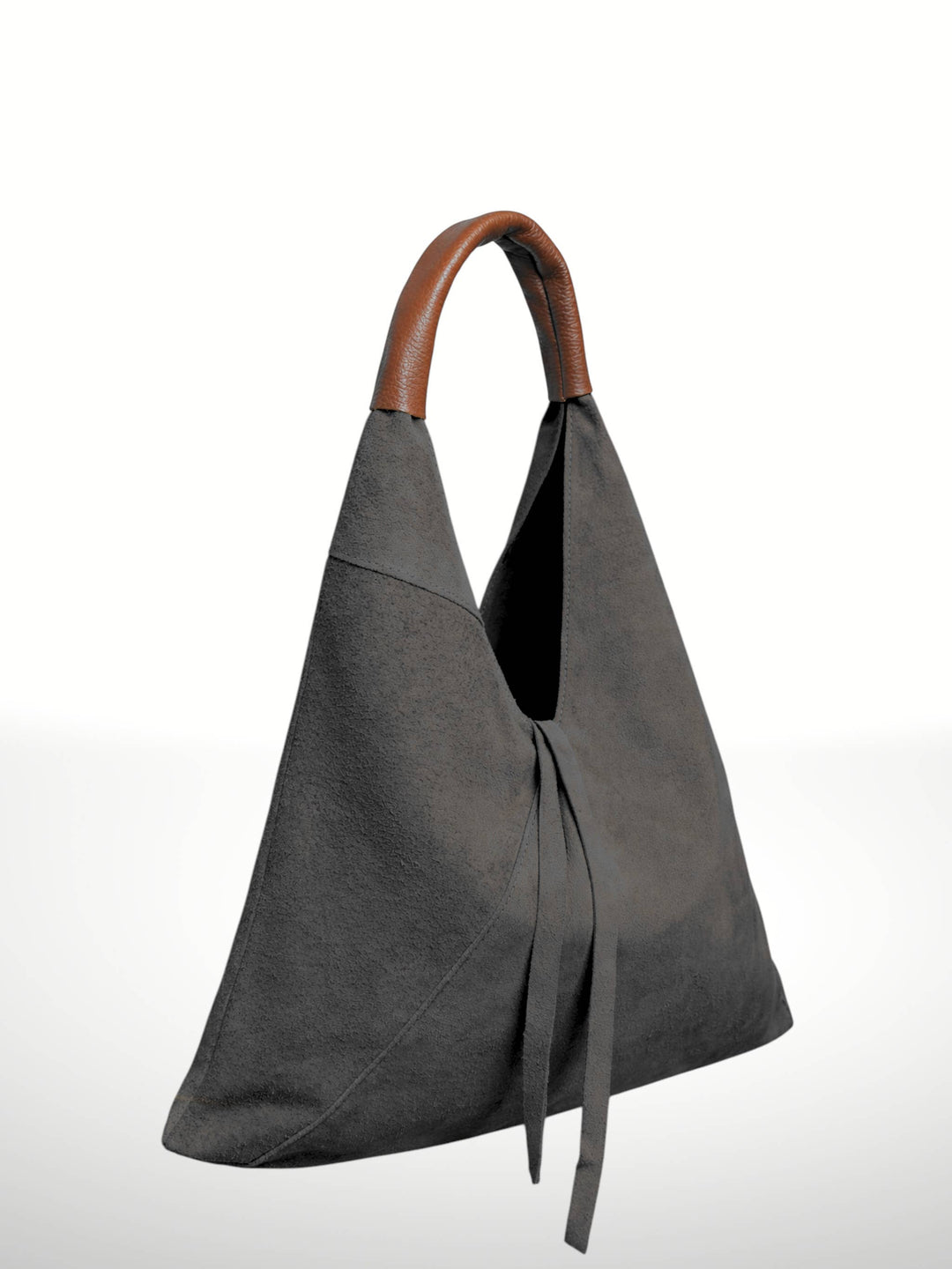 A dark gray suede hobo-style shoulder bag with a brown leather top handle and matching tie detail, shown against a plain white background.
