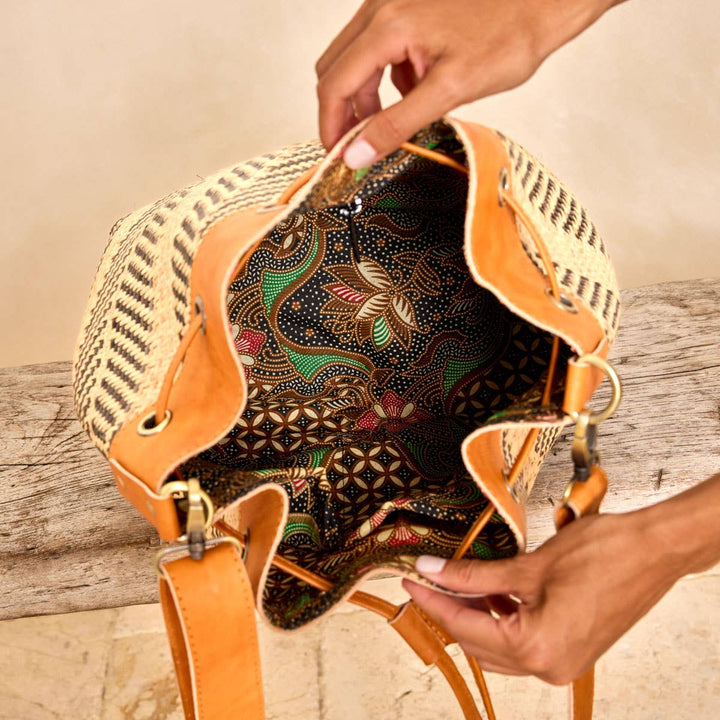Batik print lining inside handwoven rattan sling bag from the Borneo Collection
