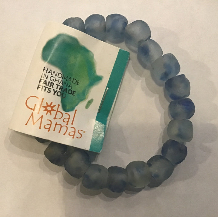 Blue beaded bracelet with a 'Global Mamas' packaging on a white background