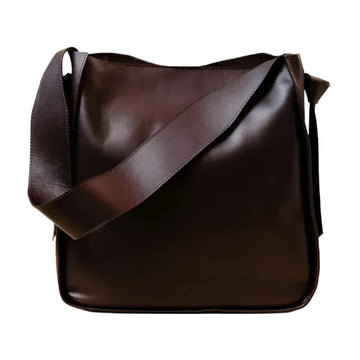 A brown knotted tote handbag made of genuine leather with an over-the-shoulder strap and a simplistic design.