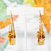 Large spiral engraved brass leaf earrings