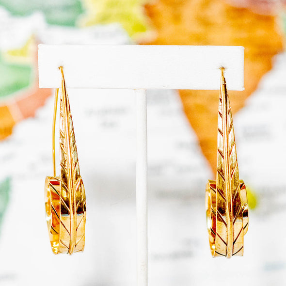 Large spiral engraved brass leaf earrings