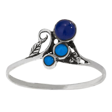 Silver ring with blue gemstones on a white background