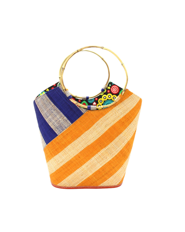 Colorful striped handbag with a decorative handle on a white background