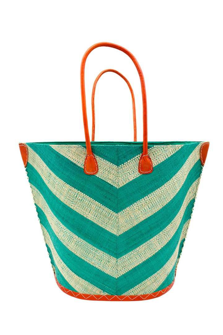 Woven basket with chevron pattern and orange handles on a white background