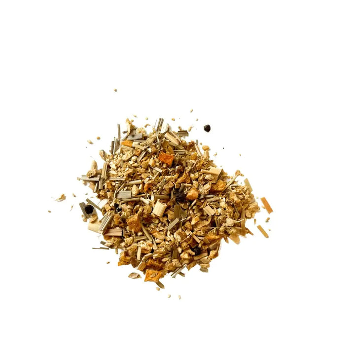 Heap of dried herbs on a white background