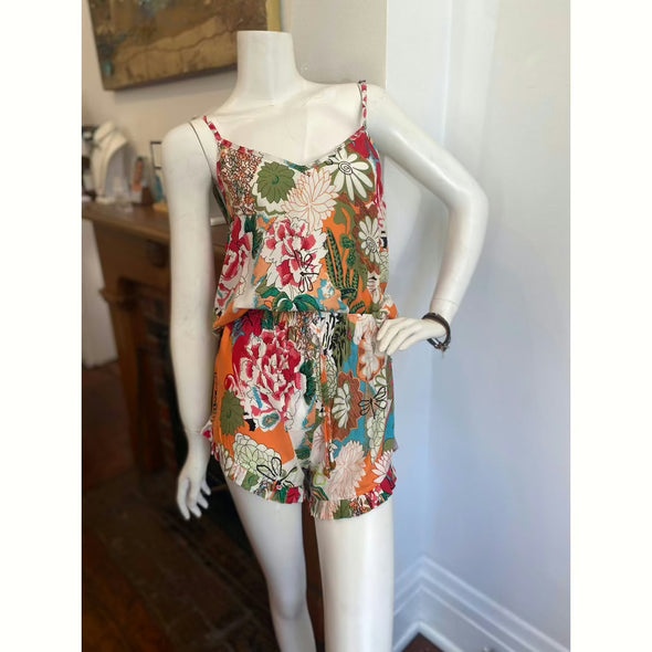 sohza sister dragonfly tank top. Spaghetti strap, heart neckline tank with colorful floral pattern. shirt on mannequin with matching shorts