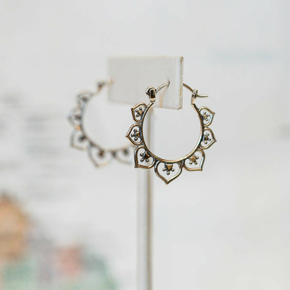 Sterling silver lotus decorated drop hoop earrings - India
